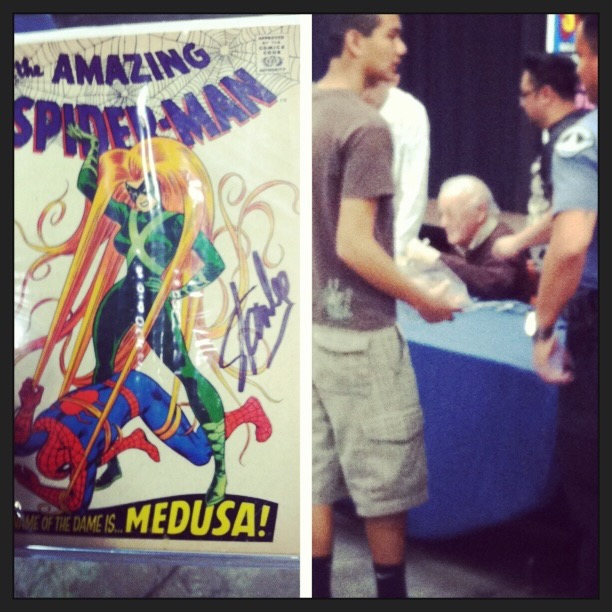 Signed Amazing Spider-Man comic and Stan Lee at a convention signing